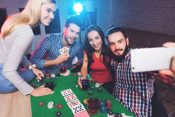Live poker dealer at arabtoto studio dealing cards across multi-camera setup
